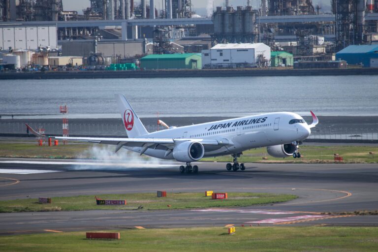 Airplane departing a Japanese airport, illustrating Japan's international tourist departure tax