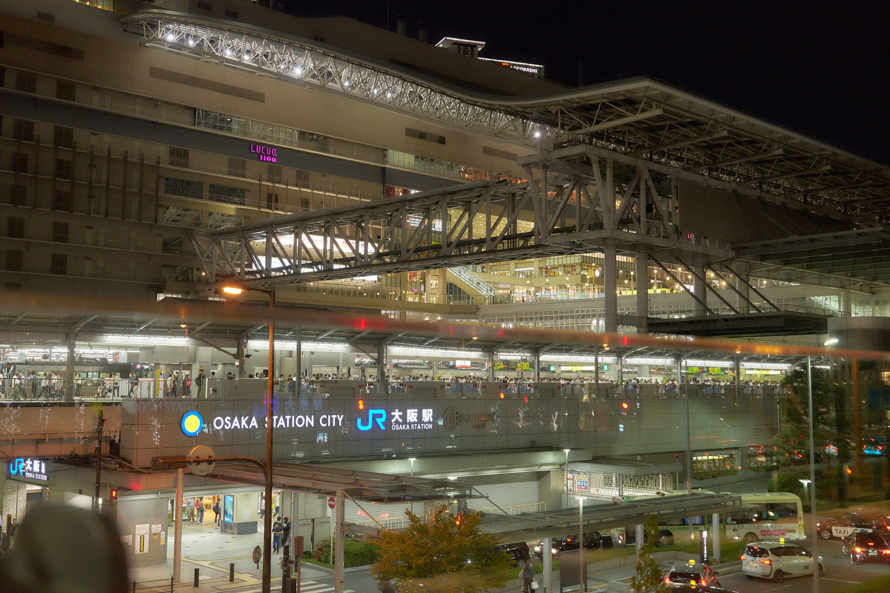 Osaka Station City and railway area illuminated at night